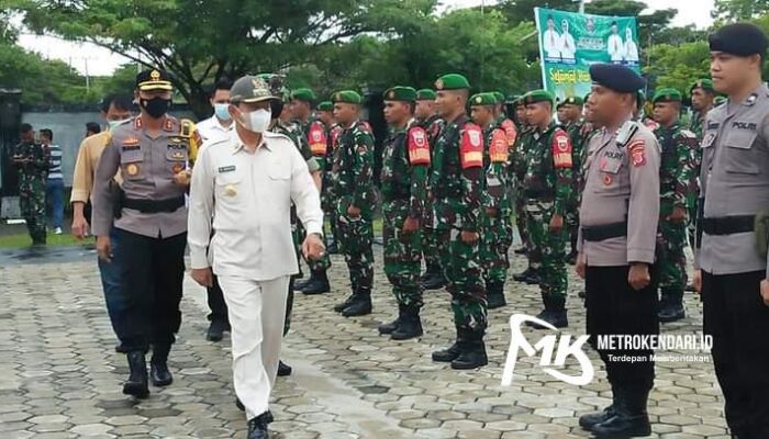 Bupati Butur Pimpin Apel Gelar Pergeseran Pasukan Pengamanan Pilkades Serentak 2022